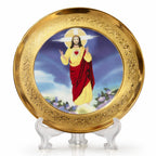 Decorative plate with a religious figure on a stand against a white background