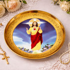 Decorative plate with a religious figure on a gold rim, surrounded by flowers and a rosary.