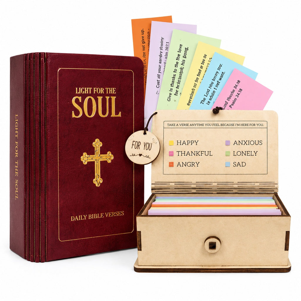 Bible with daily Bible verses and a box of colorful cards on a white background